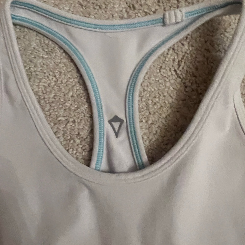 White Iviva tank top.